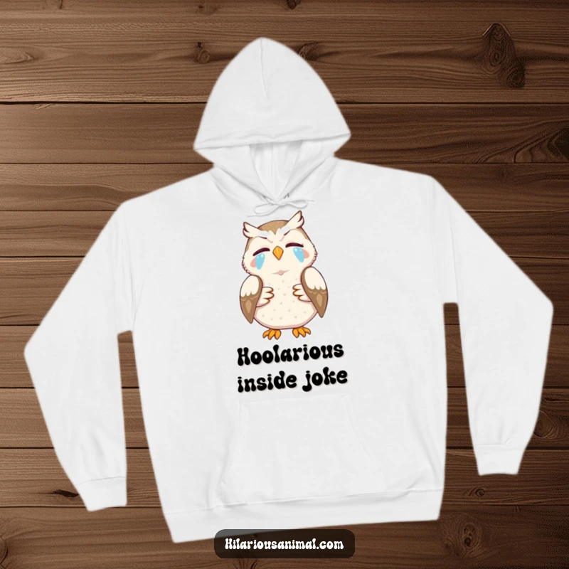 Funny hoodie depicting an owl clutching its stomach, tears streaming in laughter, representing a perfect funny gift idea.