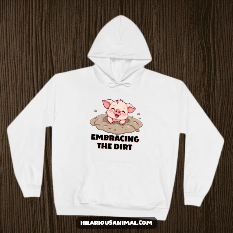 Funny Piglet Mud Puddle Hoodie - A warm hoodie featuring a smiling piglet rolling in a mud puddle, covered in joyous dirt, perfect for cozy fun.