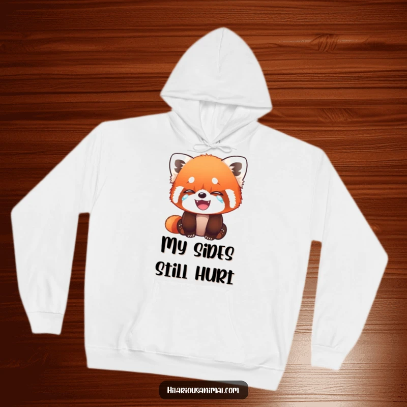 Funny Red Panda Cub Hoodie - Comfortable sweatshirt with a red panda cub wiping tears of laughter, perfect for cozy, humorous moments.