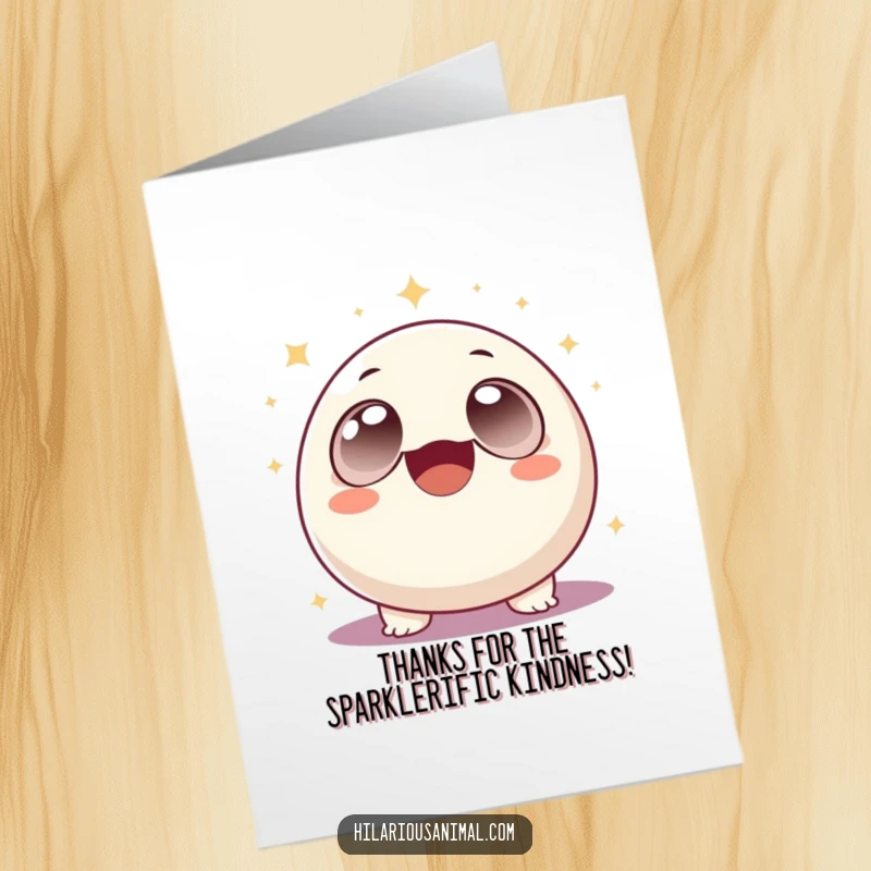 Free Printable Thank You Card depicting a round, wide-eyed creature laughing joyfully amidst a flurry of shimmering sparkles.