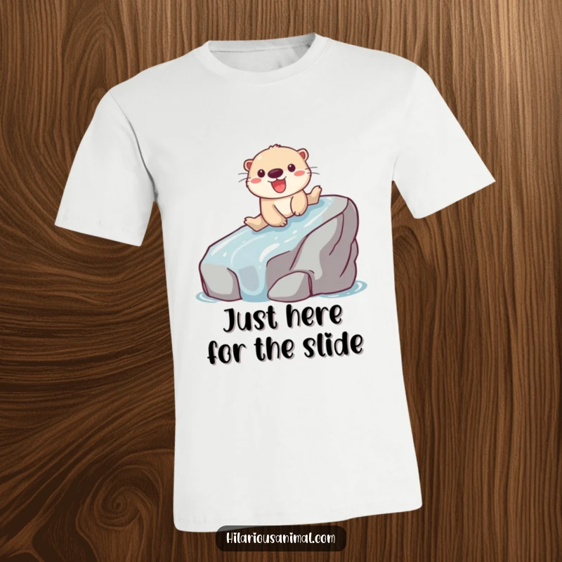 Funny t-shirt showcasing a playful otter gleefully sliding down a wet, slippery rock.